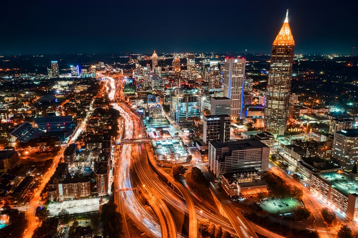 The Atlanta skyline at dusk, with the Buckhead and Midtown towers